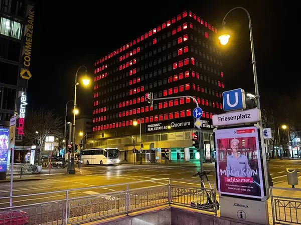 Pixellated heart and cross on the Hohenzollernring 62 building near Friesenplatz metro station in Cologne
