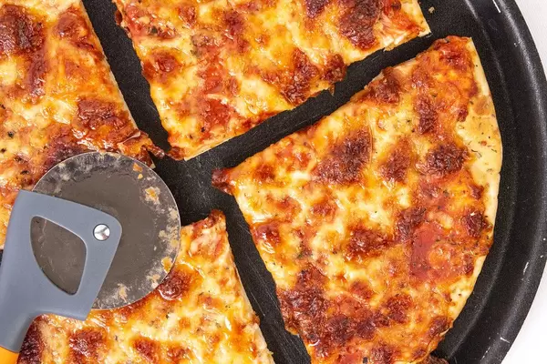 Pizza Margarita top view with pizza knife (Flip 2019)