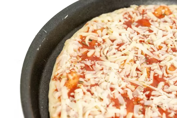Pizza Margharita prepared for baking