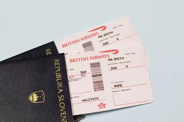 Plane tickets lying in passport