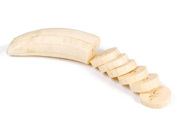 Plantain sliced on a white background