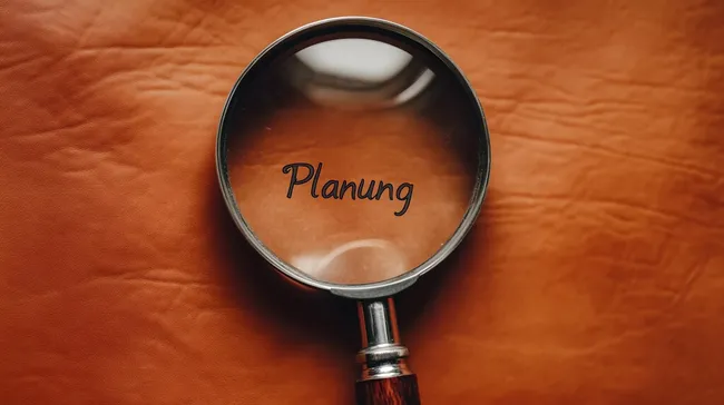 Planung durch Lupe hervorgehoben - Stockfoto