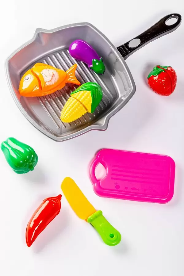 Plastic children's toys vegetables, frying pan, knife and tray