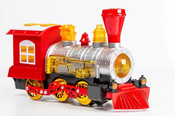 Plastic children's train on a white background