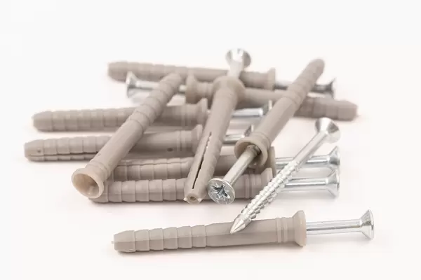 Plastic Dowels with Screws isolated above white background