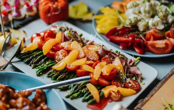 Plate of Asparagus and Tangerines