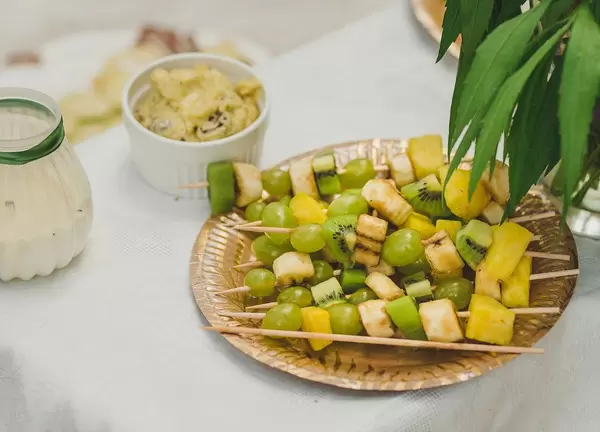 Plate OF Fresh Kiwi, Banana And Grape Pieces