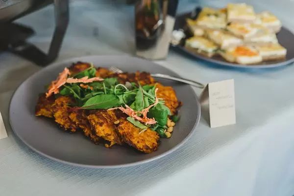 Plate Of Potatoe Pancakes With Salad