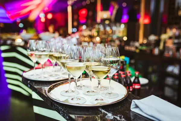 Plate Of White Wine In Restaurant Lights (Flip 2019)