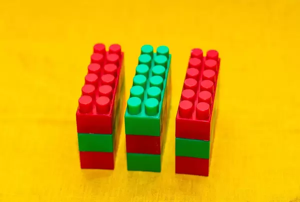 Playing Blocks On Yellow Background