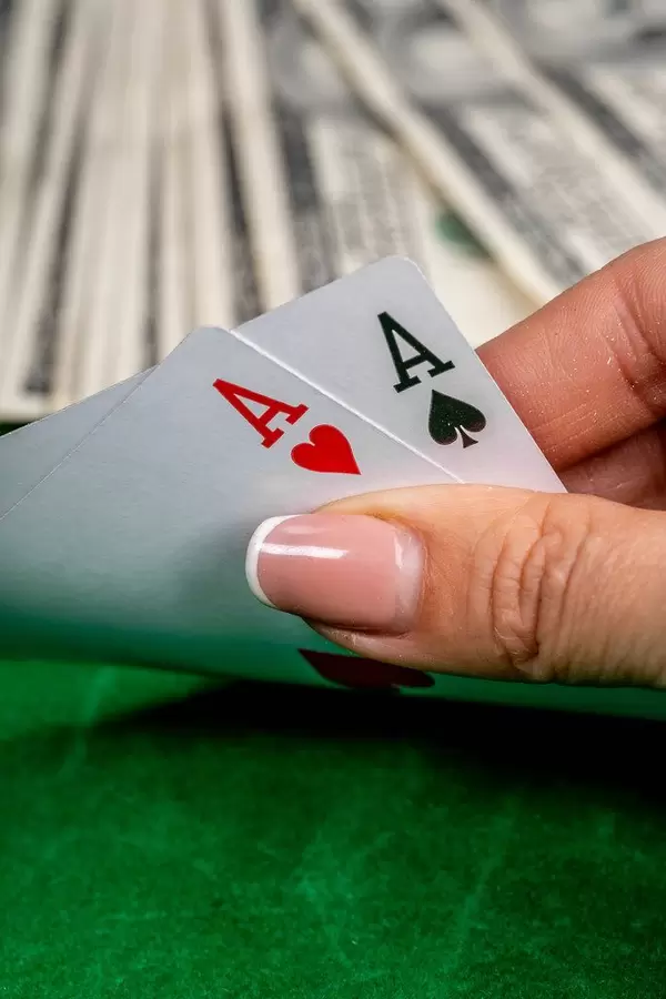 Playing poker with cards in the casino. The concept of gambling for money (Flip 2019)