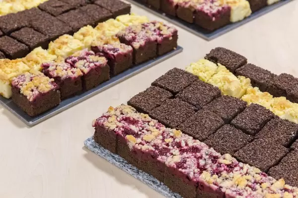 Plum and chocolate cake at a buffett