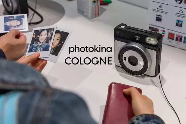 Polaroids made with the Instax sq 6 photo camera, next to the picture title "photokina Cologne".