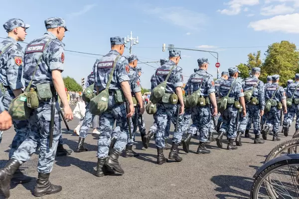 Police officers with long truncheons during World Cup 2018
