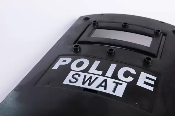 Police shield with Police Swat text