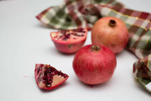 Pomenagrata Close Up on a white background  (Flip 2019)