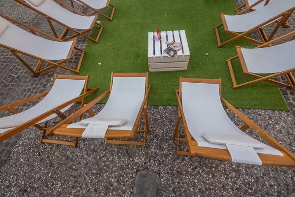 Pool chair and green carpet