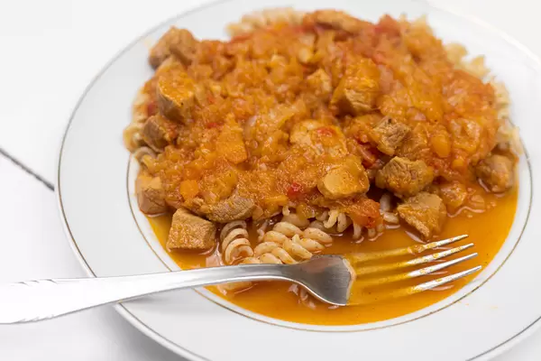 Pork Stew served with cooked macaroni