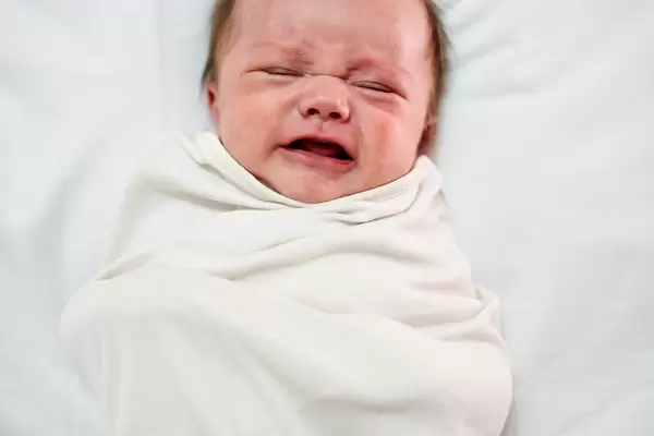 Portrait of crying infant baby boy