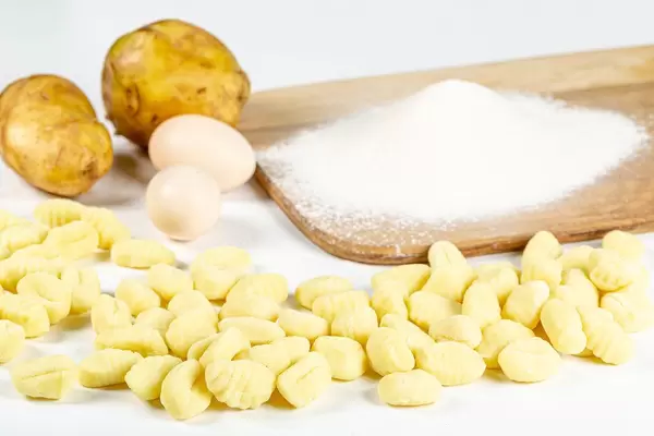Potato gnocchi with flour, eggs and potatoes. The concept of cooking
