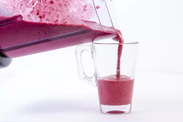 Pouring Raspberry Banana and Blackberry Smoothie in the glass (Flip 2019)