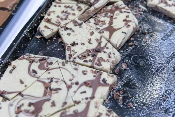 Premium chocolate with vanille and cocoa flavour on black tray at the BarCamp Bonn