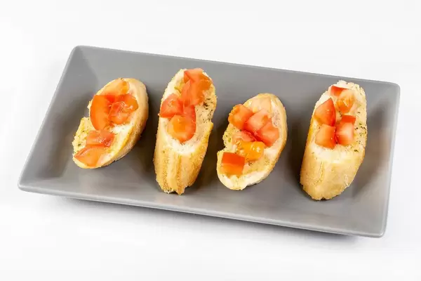 Prepared and served Bread Baguettes with Tomato and Tartar Sauce (Flip 2019)