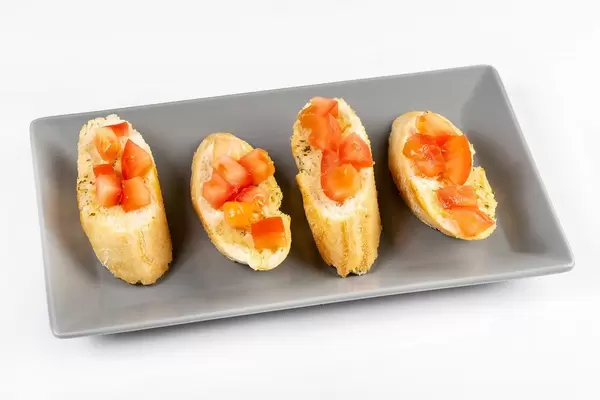 Prepared and served Bread Baguettes with Tomato and Tartar Sauce