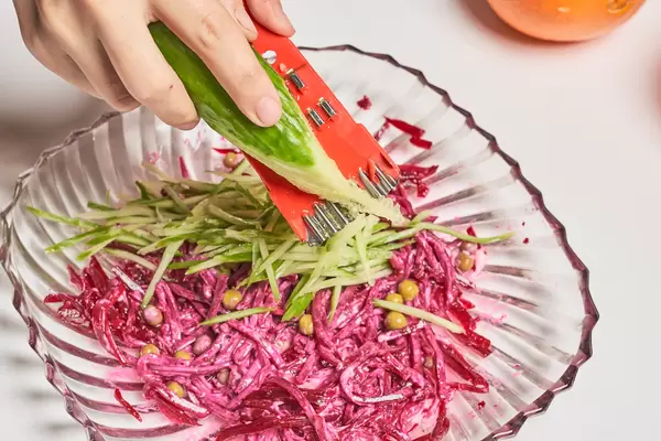 Preparing beet and cucumber based salad