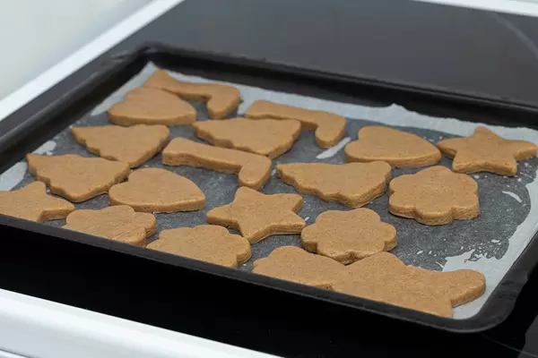Preparing Christmas cookies for baking