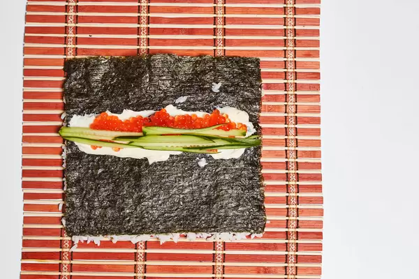 Preparing delicious homemade sushi