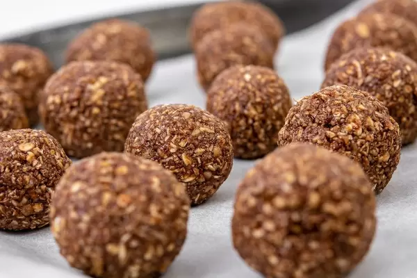 Preparing heatly Oatmeal energetic cookie balls for baking (Flip 2019)