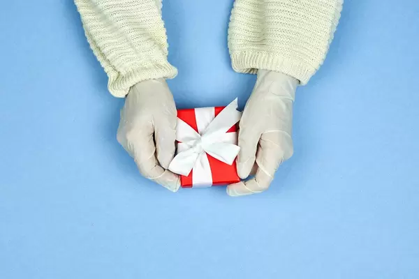 Preparing Xmas gift and sending with a courier