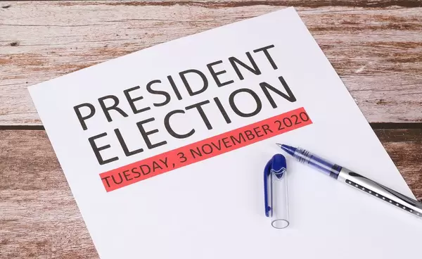 President Election date with wooden background