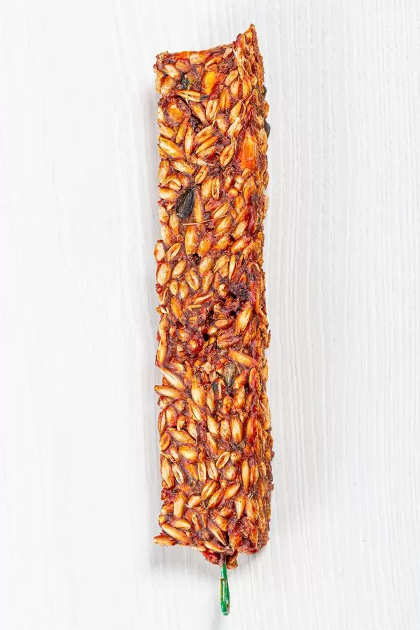 Pressed grain feed for rodents