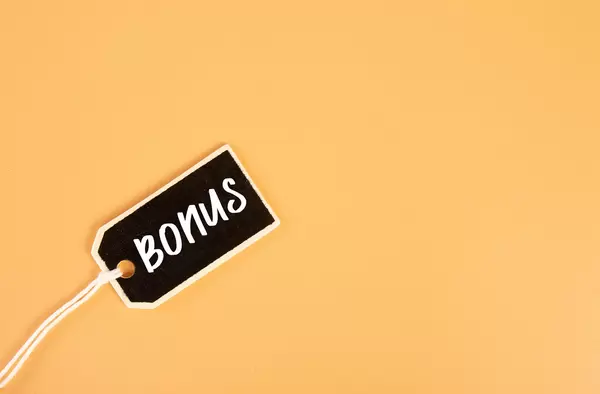 Price tag with Bonus text on orange background