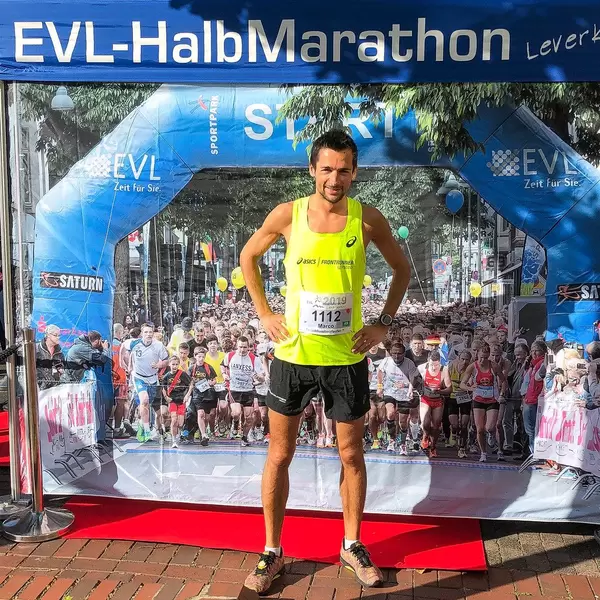 Professional Marathon Runner in Racing Singlet before Start