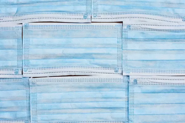 Protective face masks background. View from above