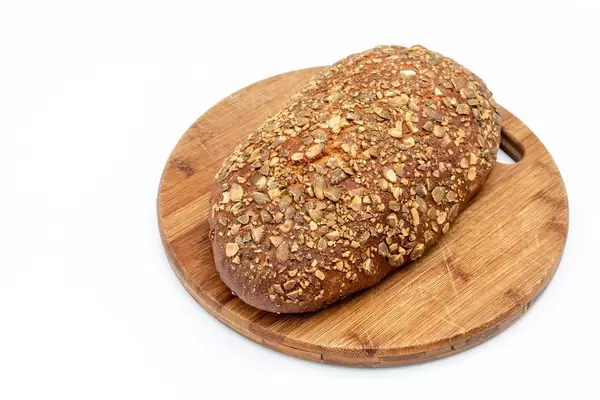 Protein Bread with Pumpkin seed on the wooden board