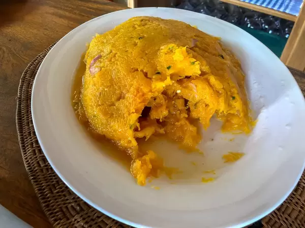 Pumpkin Chutney on white plate and wooden table