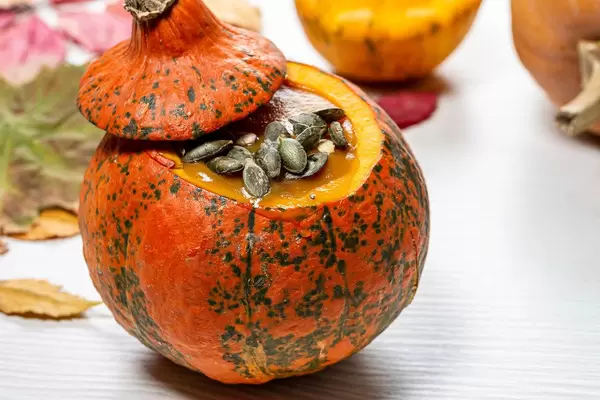 Pumpkin puree with pumpkin seeds. Halloween food concept (Flip 2019)