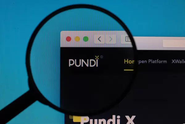 Pundi X logo under magnifying glass
