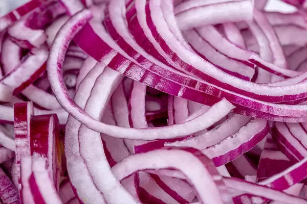 Purple ripe onion sliced, close-up
