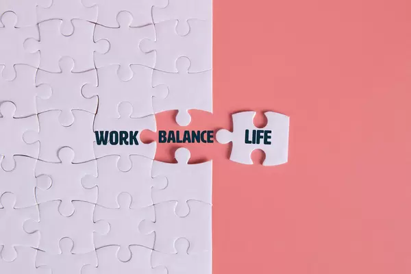 Puzzle pieces with Work, Balance, Life text