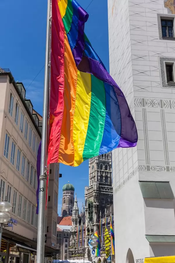 Queer-flag in the streets of Munich during pride week and CSD-Festival, near "Altes Rathaus" at Marienplatz