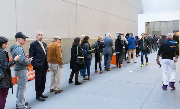 Queue in front of Public School 59: Polling Place of Trump