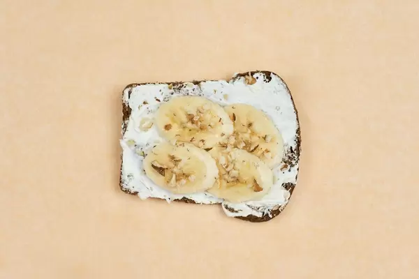 Quick fruit snack with banana slices and toast