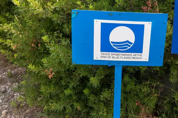 "End of blue flagged beach" is an eco-label and indicates a sustainable tourism area