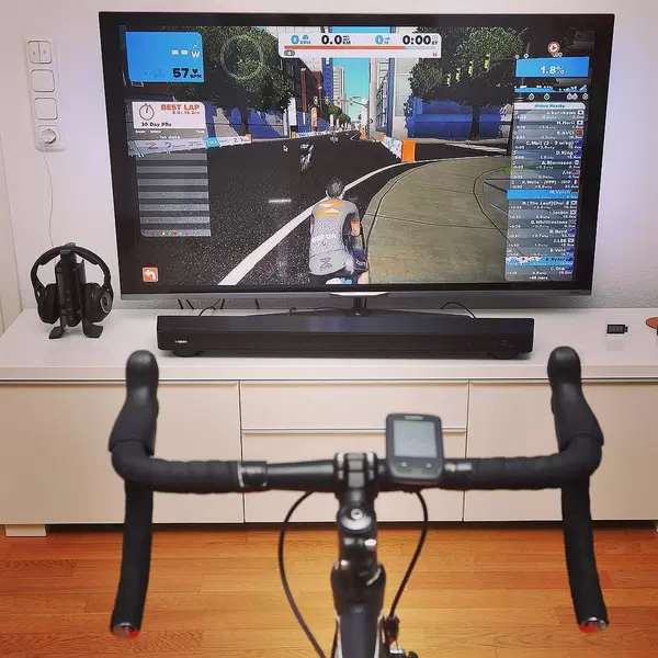 Raining outside, training inside. @gozwift is the World of Warcraft for cyclists. #zwift #gozwift #strava #cycling #training #triathlontraining #ironmantraining #happy