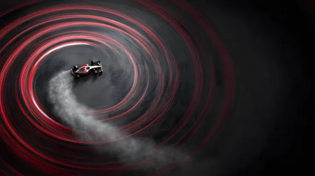 Rasante Formel-1-Kurvenfahrt in Rot und Dunkel